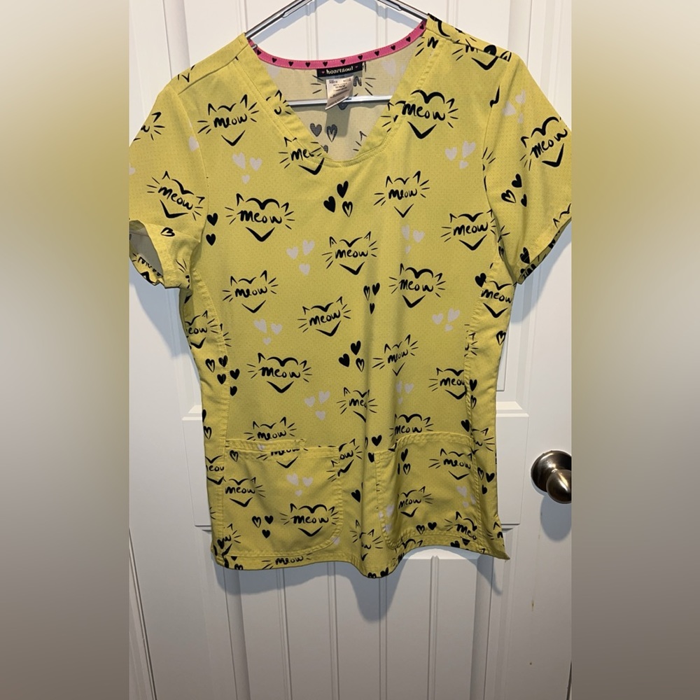 Yellow HeartSoul  v neck scrub top. Size medium. Pitter-patter material